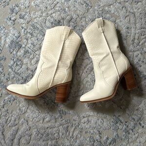 MIA boots worn once for an hour. Nearly new